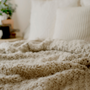 Throws vs. Blankets: Understanding the Differences and Choosing the Perfect Cozy Companion