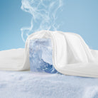 Cooling comforter for hot sleepers on bed