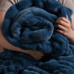 Cozy hug with deep blue dual-sided elastic bunny faux fur plush blanket
