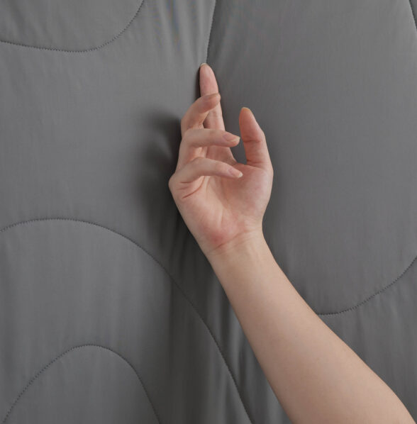 Dark Gray Cooling Blanket Touch Shot, Breathable Cooling Fabric Texture