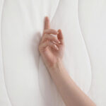 White Cooling Blanket Touch Shot, Lightweight Cooling Fabric Close Up